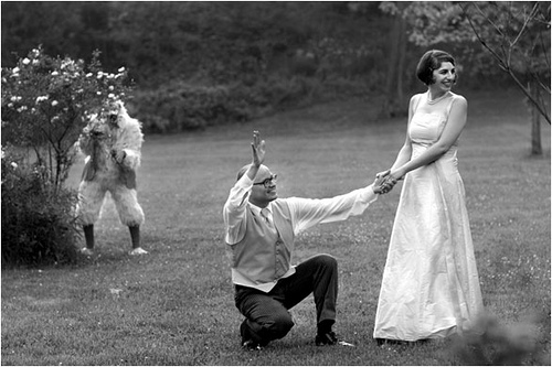 Even on her wedding day, Maureen couldn't hide from the Chicken Creeper. Funny Wedding Pictures, Bad Wedding Photos,Wedding disasters, disastrous weddings, ugly wedding dresses, bad wedding dresses, wedding photography, wedding photographers, horrible weddings, wedding invitations, affordable weddings, worst wedding pictures