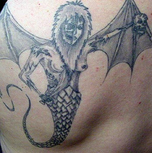 That's charming. Boobs Beast Wings Tattoo Worst Tattoos, Funny Tattoos bad tattoos Horrible Ugliest Tattoos Stupid Ugly Awful WTF Fail