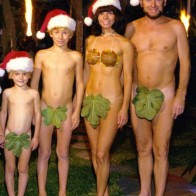 Worst family Christmas cards, funny christmas portraits, awkward family christmas photos, Bad Family Holiday Pics, ellen, funny pictures, sitting on santa's lap, bad mall santa's scary, family in fig leafs