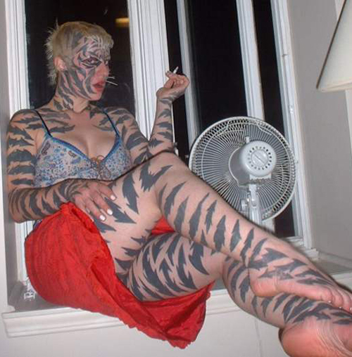 [Image: Bad-Tattoos-Tiger-Woman.jpg]