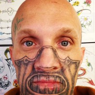 Hannibal Lector Tattoo Silence of the Lambs worst tattoos bad tattoos ugliest tattoos horrible tattoos, awkward awful stupid people nasty wtf