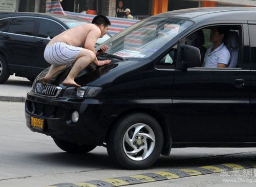 My neighbor Corey always held a great disdain for minivans. Man in underwear on Car Balls door knocker funny pictures weird pictures pics awkward family photos bad tattoos worst tattoos stupid people bad family photos funny family pics random strange