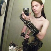 goth punk kid posing with cats bad self portraits bad Family Portraits Bad Family Photos Ellen worst family pics funny pictures awkward family photos wtf ugly people stupid people crazy people weird people