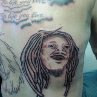 Bad Bob Marley Tattoo Jah back tattoo funny tattoos bad tattoos terrible awful ugliest tattoos wtf tattoos, horrible awkward family worst tattoos photos crazy people weird people stupid humor redneck humor photobombs