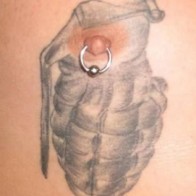 Hand Grenade Niplle Tattoo Funny Tattoos regrettable bad tattoos terrible awful ugliest tattoos wtf tattoos, horrible tattoos awkward family photos america's worst tattoos photos crazy people weird people stupid humor redneck humor