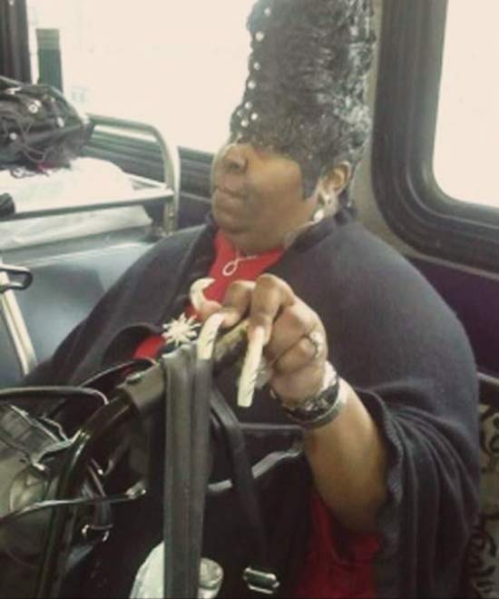 Big hair & nails ghetto momma on bus Awkwardly Funny Family Photos. 