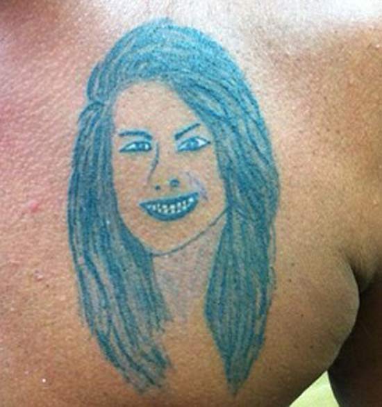 Bad Glowing Portrait of Woman – The Worst Tattoos, The Ugliest Regrets, too.
