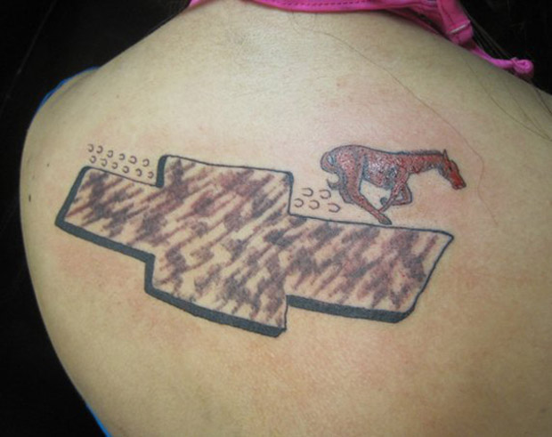 Horse galloping over Chevy Logo ~ the ugliest bad worst tattoos