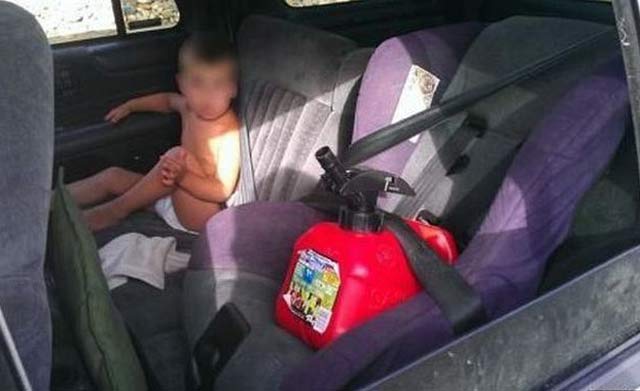 gas can strapped in baby car seat with baby sitting next to it ~ Worst Parents Ever