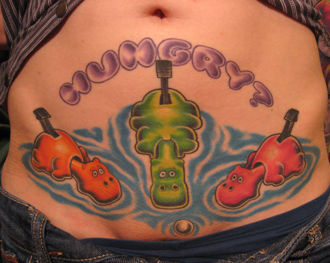 Hungry Hippos tattoo on stomach above crotch pelvic ~ the ugliest bad worst tattoos