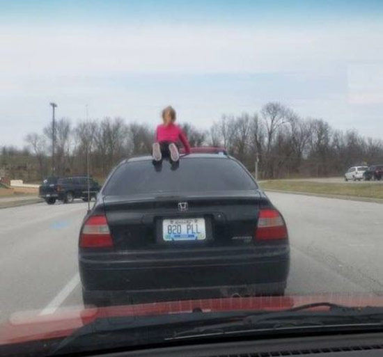little girl riding on hood of car ~ Worst Parents Ever