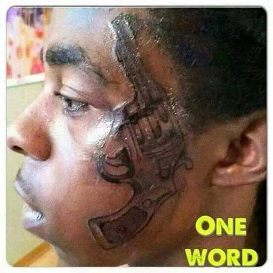 Pistol on face gun ~ the ugliest bad worst tattoos one word