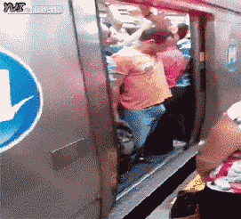 fat-man-subway-doors-bruce-lee.gif